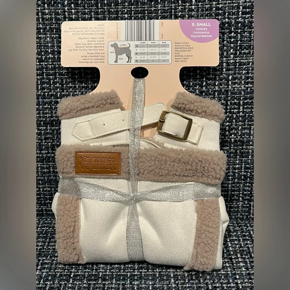 Dog jacket Sherpa lined with buckle neck closure. Cream color tan detailing. XS